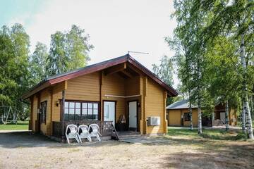 Фото номера Шале с 3 спальнями Кемпинги Marjoniemi Camping г. Hiidenniemi 17